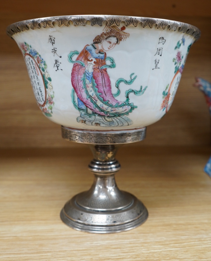 A mid 19th century Chinese famille rose bowl, with European silver mounts, 21cm. Condition - later silver mounts, hairline crack